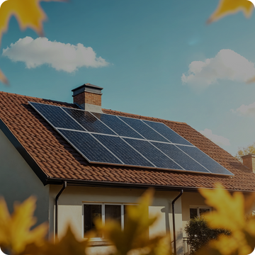 Rooftop solar panels installed on homes in a residential society